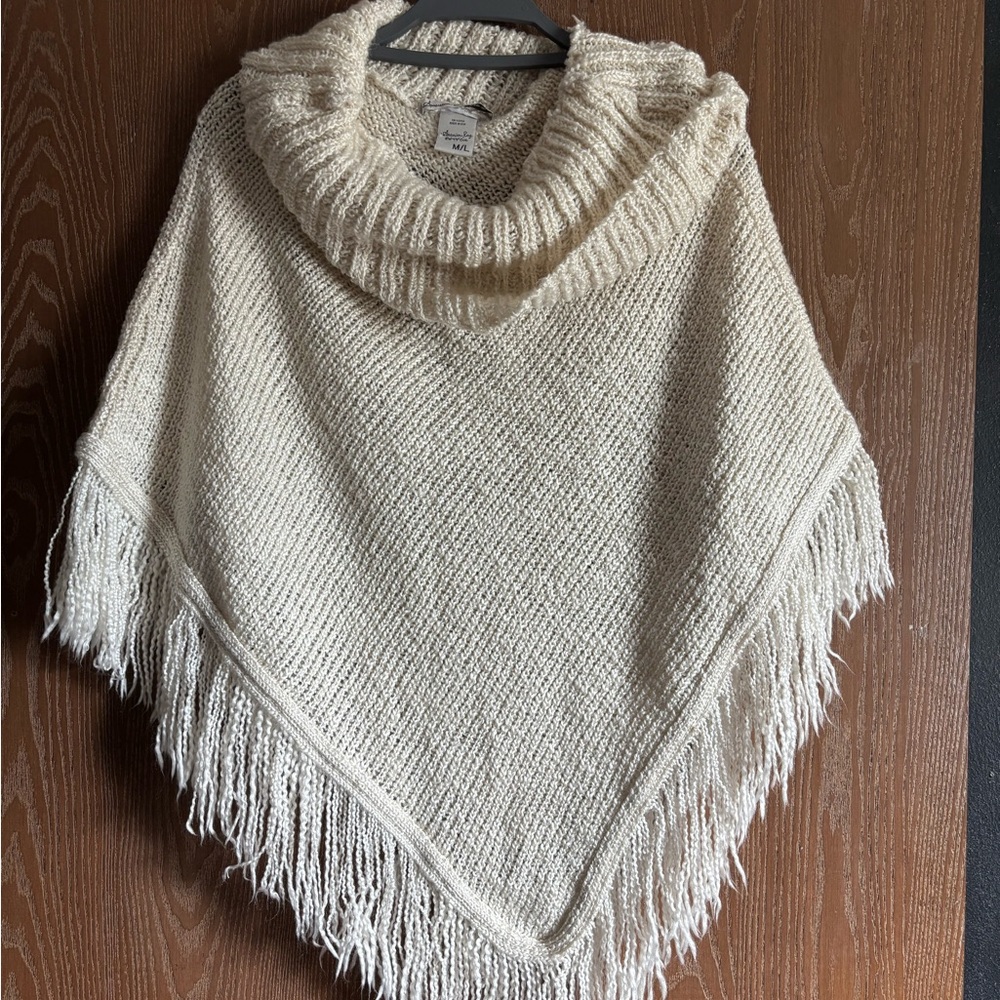 Cozy Cream Knit Poncho with Fringe